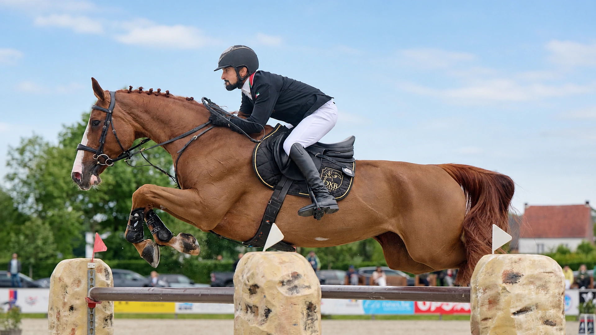 Competition rider wearing a Vainqueur equestrian jacket